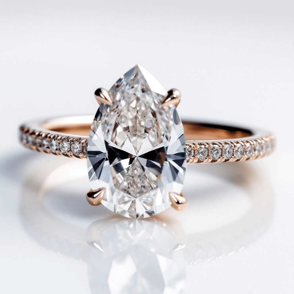 A pear-cut engagement ring with a pavé band