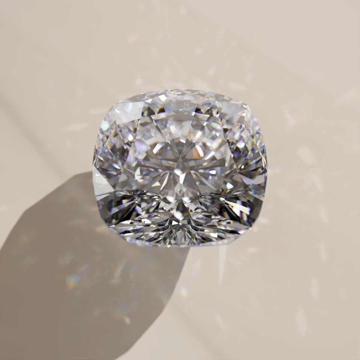 A cushion-cut moissanite seen from above on a pale surface