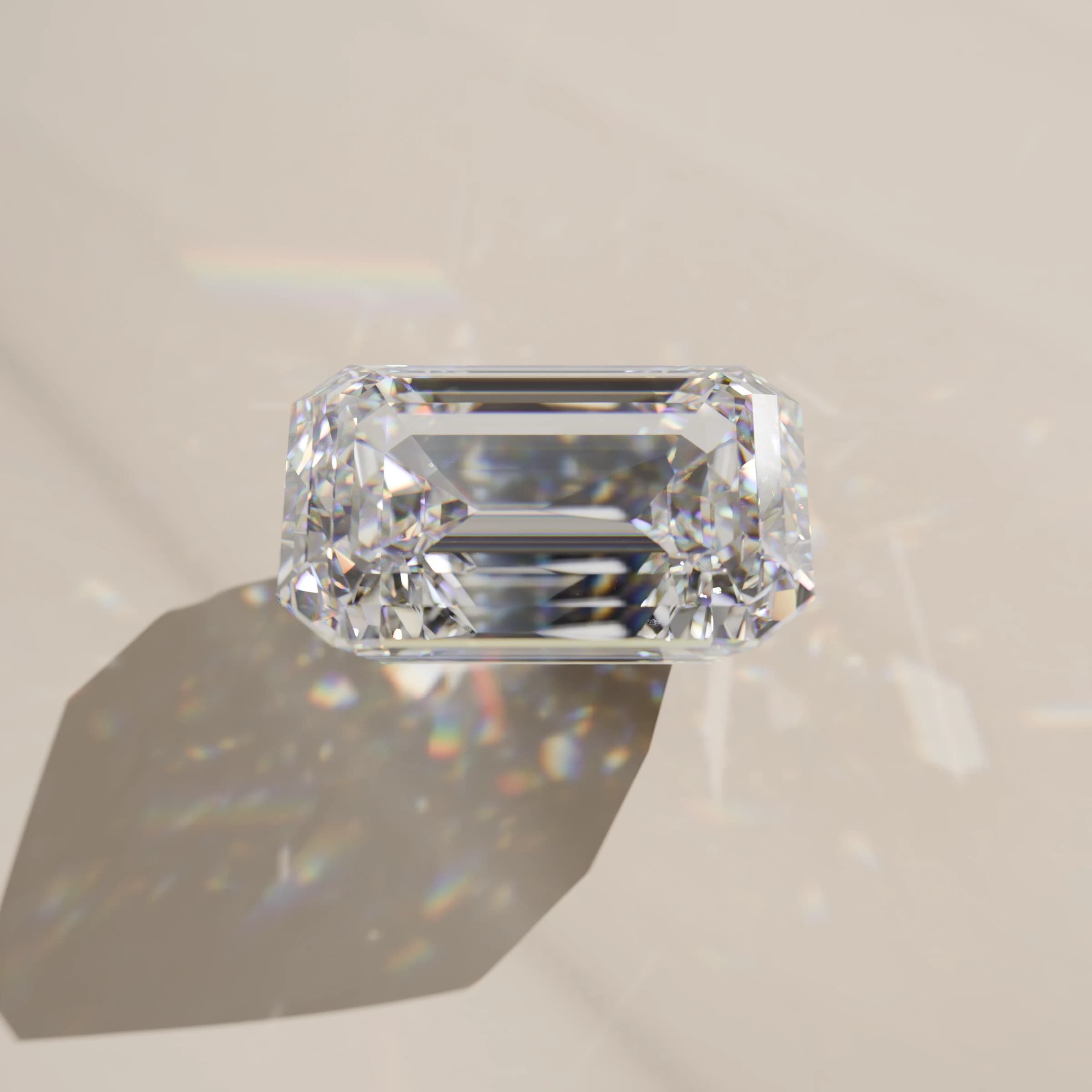 An emerald-cut moissanite on a pale surface